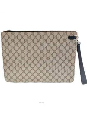 433665 Three stripe GG strap clutch bag