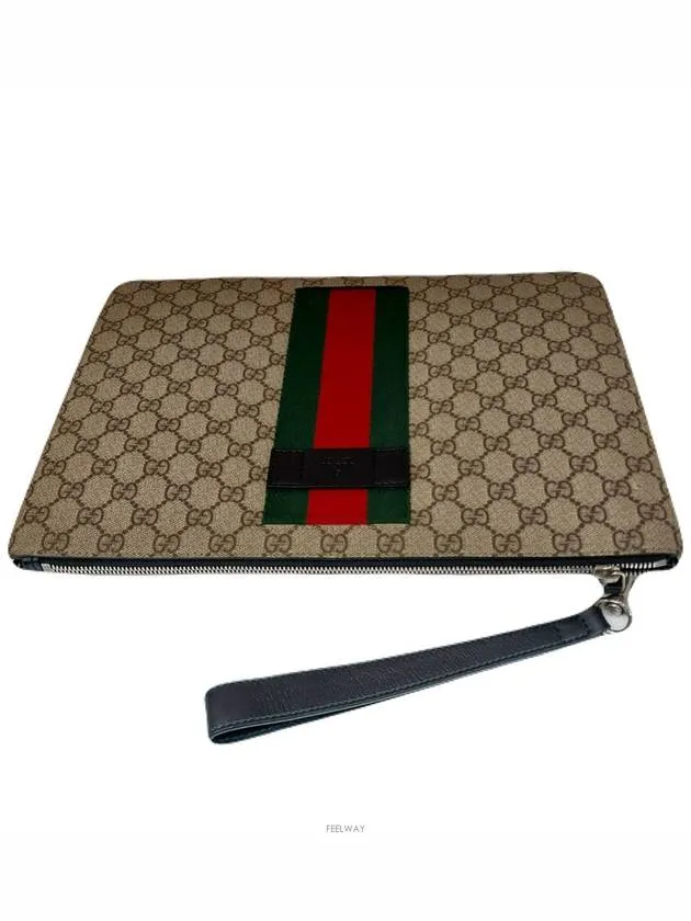 433665 Three stripe GG strap clutch bag