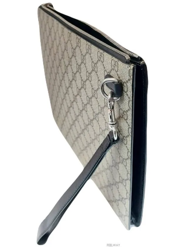 433665 Three stripe GG strap clutch bag