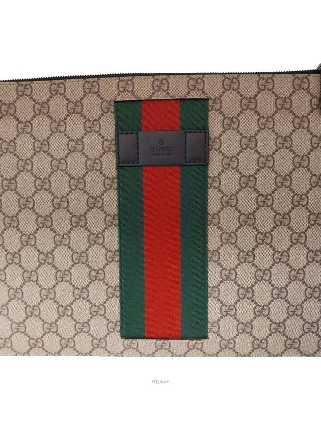 433665 Three stripe GG strap clutch bag