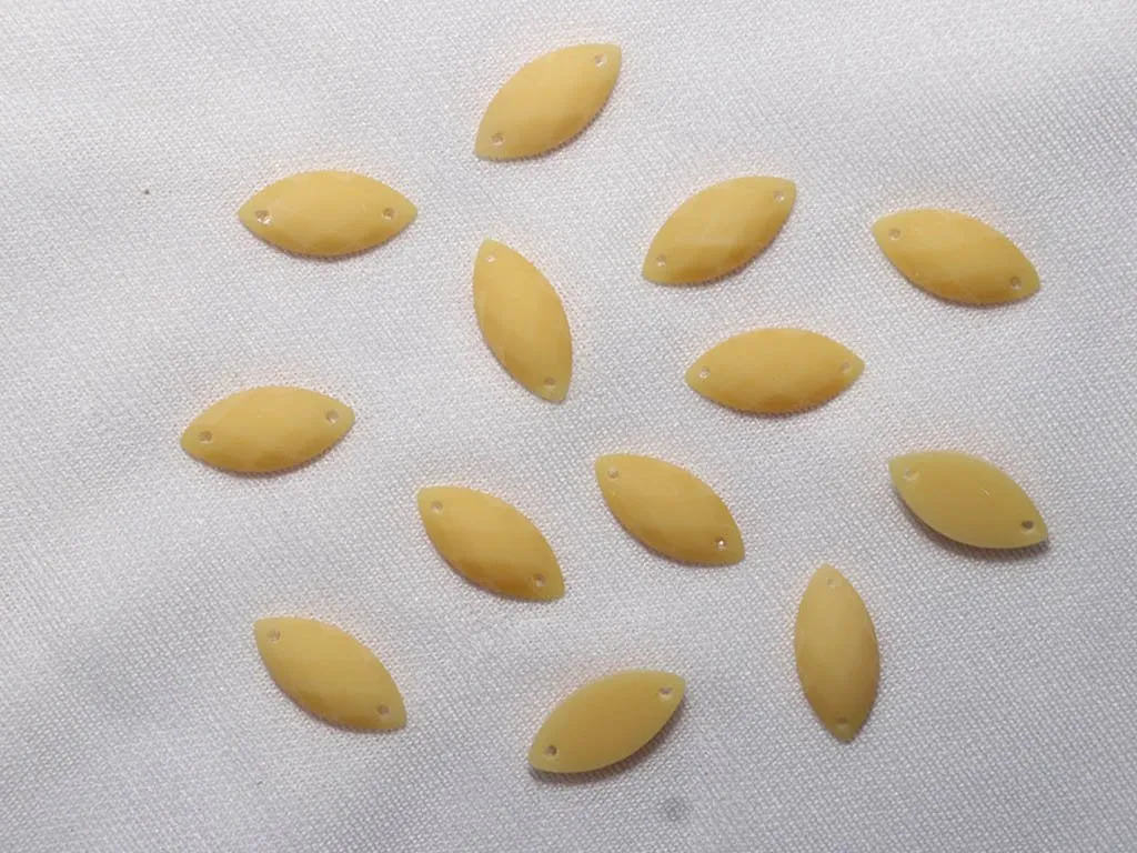 Yellow 2 Hole Eye Dyeable Plastic Stones - 15x7 mm